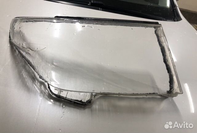Стекло фары на Тойота ленд крузер 200 2014 года с