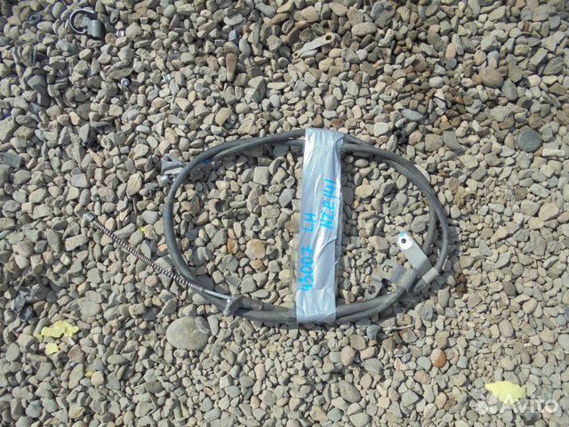 Трос ручника левый Toyota Corolla Fielder NZE141