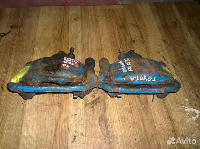 Суппорт предний правый левый toyota corolla ae92