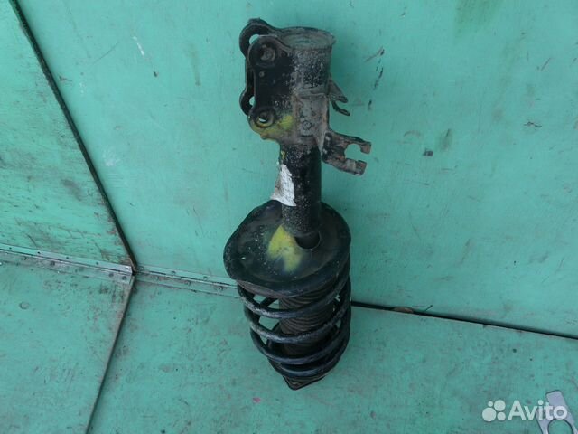 Стойка передняя левая Nissan Almera Classic 442103