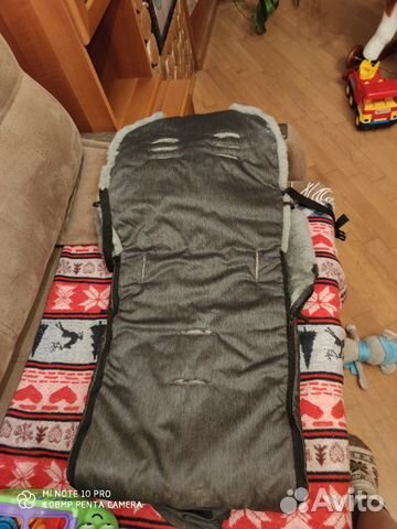 Зимний меховой конверт в коляску Зимний меховой конверт в коляску