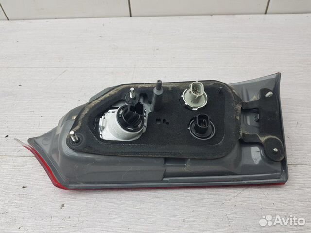 Фонарь в крышку левый Toyota Corolla E180 1ZR-FE