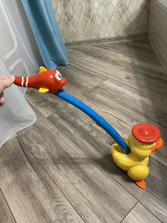 Каталка утка музыкальная