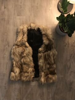 Меховая жилетка