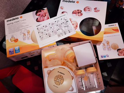 Молокоотсос medela swing maxi
