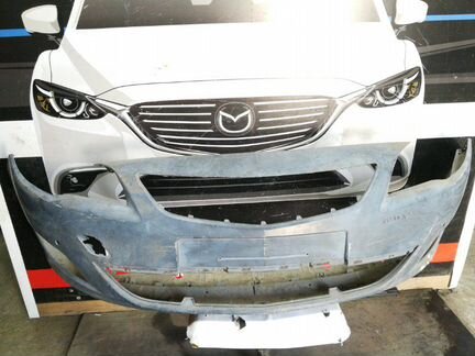 Бампер передний Opel Astra J