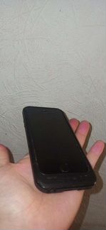 Телефон iPhone 5 с дополнительной батареей